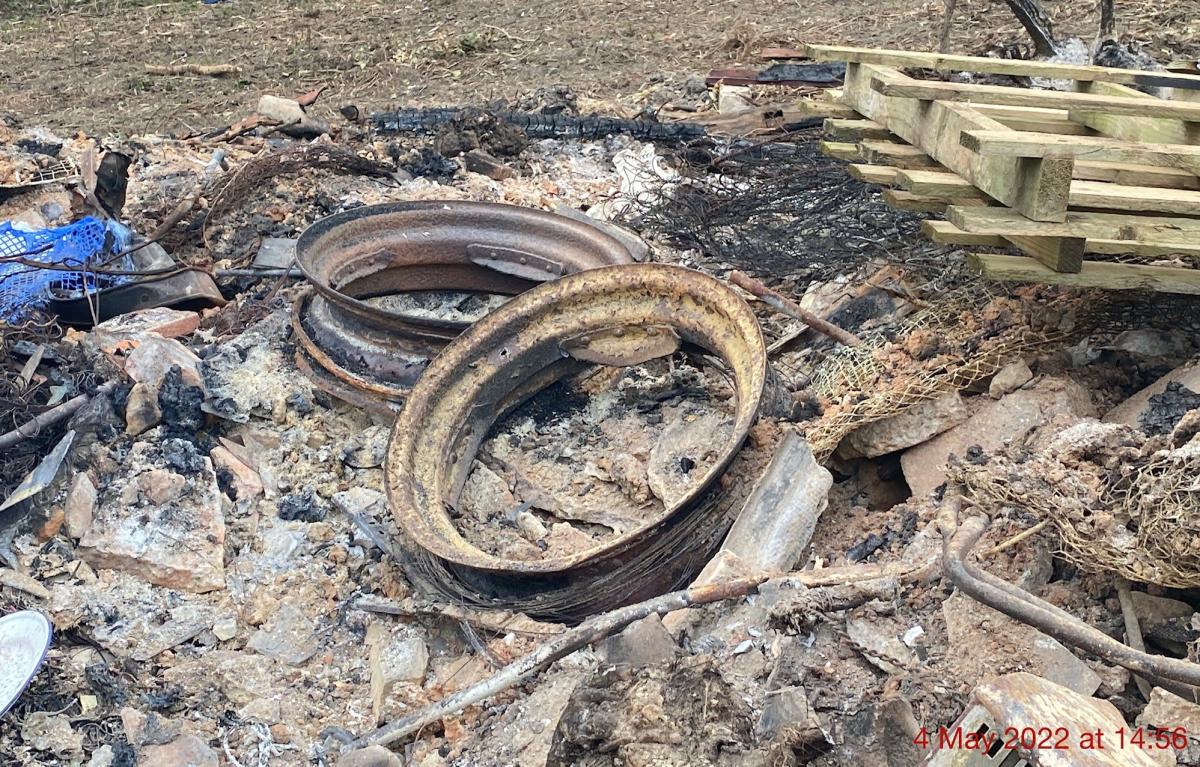 the remains of an illegal fire