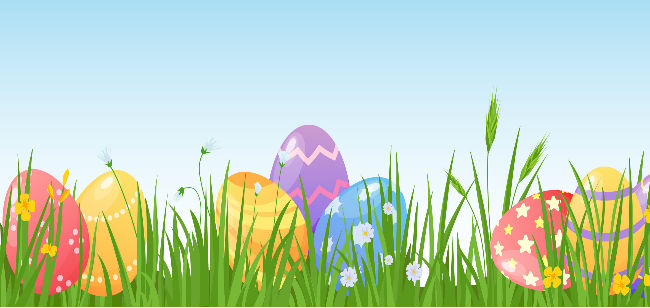 coloured Easter eggs on grass 