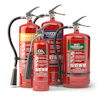 four red fire extinguishers grouped together