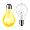 one yellow and one clear light bulb