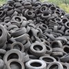 pile of used car tyres